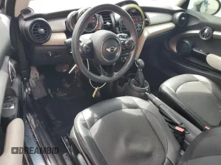 2014 MINI Hardtop with VIN WMWXM5C51ET934047, listed as a Copart auction lot 63039335 with 104,446 mi miles and Salvage title. Bid and sale history available at DreamBid. Image 8.