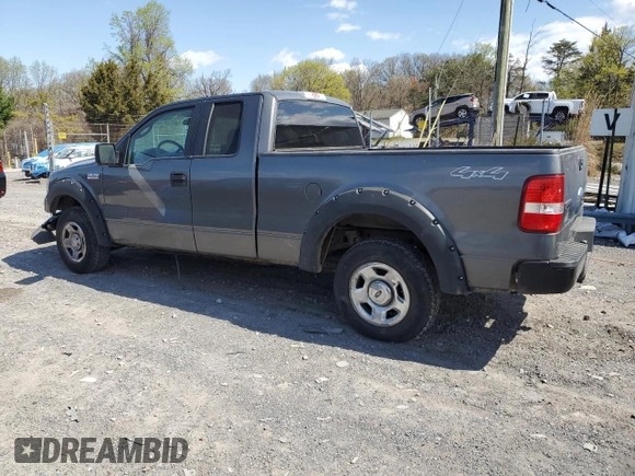 2007 Ford F-150 XLT with VIN 1FTPX14597NA52942, listed as a Copart auction lot 52980215 with 149,889 mi miles and Salvage Title. Bid and sale history available at carsss.com. Image 2.