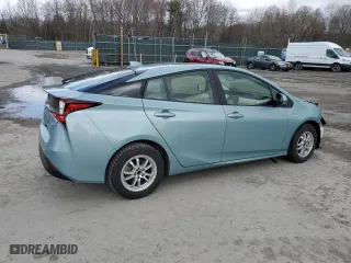 2021 Toyota Prius L Eco with VIN JTDKAMFU0M3134583, listed as a Copart auction lot 52434195 with 26,018 mi miles and Salvage Title. Bid and sale history available at carsss.com. Image 3.