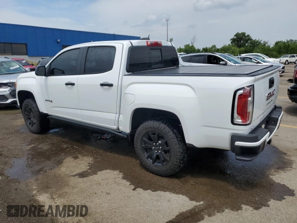 2021 GMC Canyon 4WD AT4 w/Cloth with VIN 1GTG6FEN8M1295482, listed as a Copart auction lot 59433404 with 34,637 mi miles and Non Repairable. Bid and sale history available at carsss.com. Image 2.