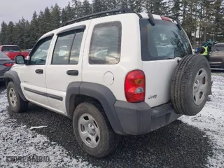 2004 Jeep Liberty Sport with VIN 1J4GL48K14W115867, listed as a IAAI auction lot 41482160 with 179,090 mi miles. Bid and sale history available at carsss.com. Image 3.