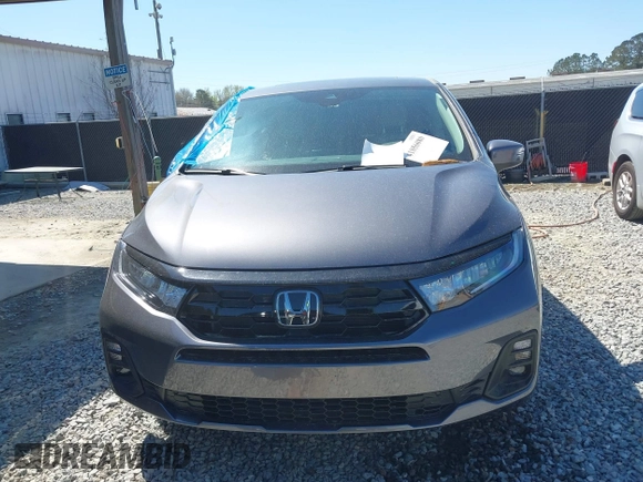 2025 Honda Odyssey Touring z VIN 5FNRL6H84SB028769, wystawiony jako IAAI lot #41856080 z przebiegiem Nie podano mil oraz . Historia ofert i sprzedaży dostępna na DreamBid. Obrazek 11.