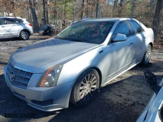 2011 Cadillac CTS Sedan with VIN 1G6DA5EY0B0125175, listed as a IAAI auction lot 41671242 with 198,495 mi miles. Bid and sale history available at carsss.com. Image 2.