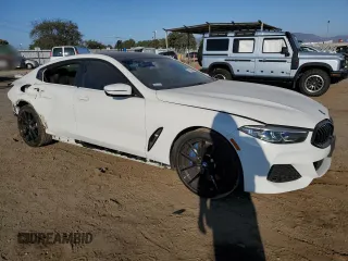 2022 BMW 8 Series 840i with VIN WBAGV2C0XNCG81832, listed as a Copart auction lot 74798684 with 27,972 mi miles and Salvage Title. Bid and sale history available at carsss.com. Image 4.