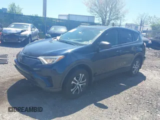 2017 Toyota RAV4 LE with VIN JTMBFREV8HJ168975, listed as a IAAI auction lot 42139354 with 91,394 mi miles and . Bid and sale history available at DreamBid. Image 2.