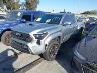 2024 Toyota Tacoma 4WD SR5 with VIN 3TMLB5JN4RM021667, listed as a IAAI auction lot 41343801 with 5,037 mi miles. Bid and sale history available at carsss.com. Image 17.