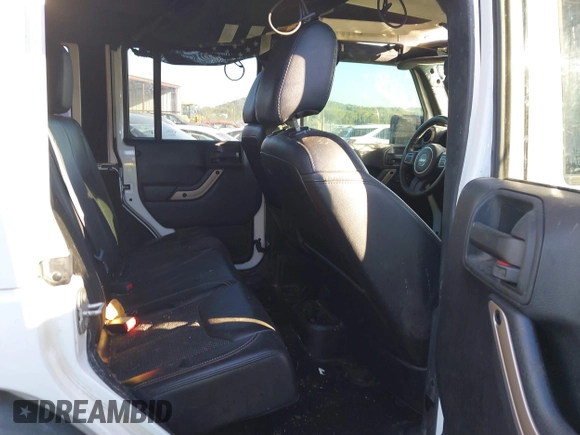 2016 Jeep Wrangler Unlimited Sahara with VIN 1C4BJWEG5GL243004, listed as a IAAI auction lot 40438321 with 121,360 mi miles and . Bid and sale history available at DreamBid. Image 8.