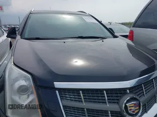 2011 Cadillac SRX Performance Collection with VIN 3GYFNEEY9BS675746, listed as a IAAI auction lot 41735676 with 113,079 mi miles and . Bid and sale history available at carsss.com. Image 13.