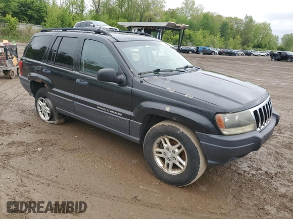 2003 Jeep Grand Cherokee Laredo z VIN 1J4GW48S53C568929, wystawiony jako Copart lot #57604245 z przebiegiem 216 103 mil mil oraz Czysty tytuł • Clean title. Historia ofert i sprzedaży dostępna na DreamBid. Obrazek 4.