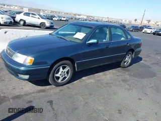 1998 Toyota Avalon XL with VIN 4T1BF18BXWU267131, listed as a IAAI auction lot 41518513 with 208,023 mi miles and . Bid and sale history available at DreamBid. Image 18.
