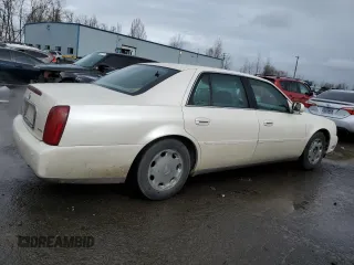 2002 Cadillac DeVille DHS z VIN 1G6KE57Y42U277428, wystawiony jako Copart lot #45757115 z przebiegiem 143 741 mil mil oraz Czysty tytuł • Clean title. Historia ofert i sprzedaży dostępna na DreamBid. Obrazek 3.