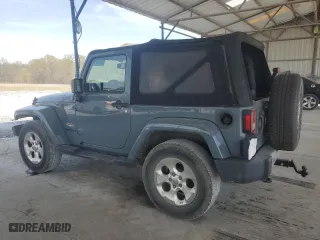 2015 Jeep Wrangler Sahara with VIN 1C4AJWBG9FL729104, listed as a Copart auction lot 51065615 with 216,779 mi miles and Clean Title. Bid and sale history available at carsss.com. Image 2.