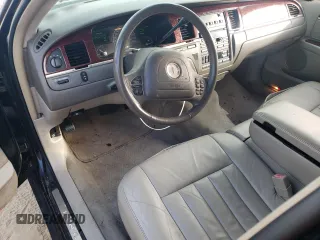 2003 Lincoln Town Car Executive z VIN 1L1FM81W23Y631965, wystawiony jako Copart lot #44536145 z przebiegiem 43 743 mil mil oraz Czysty tytuł • Clean title. Historia ofert i sprzedaży dostępna na DreamBid. Obrazek 8.