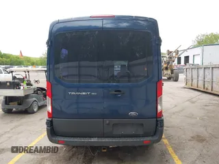 2016 Ford Transit XL z VIN 1FMZK1CMXGKA96199, wystawiony jako IAAI lot #42379883 z przebiegiem 146 181 mil mil oraz . Historia ofert i sprzedaży dostępna na DreamBid. Obrazek 16.