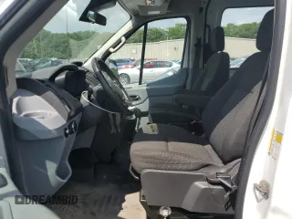 2016 Ford Transit Cargo with VIN 1FTYR2CM1GKB43234, listed as a Copart auction lot 65311135 with 59,502 mi miles and Salvage title. Bid and sale history available at DreamBid. Image 7.