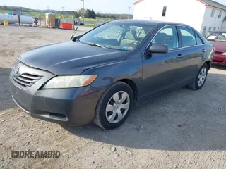 2007 Toyota Camry CE with VIN 4T1BE46K17U001229, listed as a IAAI auction lot 42072932 with 237,786 mi miles. Bid and sale history available at carsss.com. Image 17.