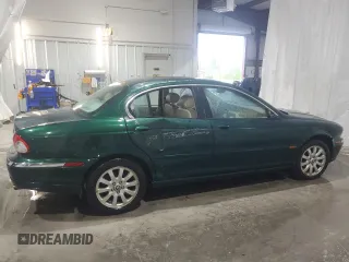 2003 Jaguar X-Type 2.5L Manual z VIN SAJEA51D63XD54591, wystawiony jako Copart lot #57638355 z przebiegiem Nie podano mil oraz Szkody całkowita. Historia ofert i sprzedaży dostępna na DreamBid. Obrazek 3.