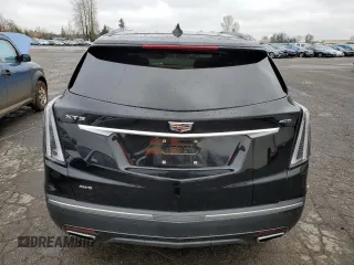 2021 Cadillac XT5 AWD Sport z VIN 1GYKNGRS3MZ158562, wystawiony jako Copart lot #43593295 z przebiegiem 32 293 mil mil oraz Szkoda całkowita • Salvage title. Historia ofert i sprzedaży dostępna na DreamBid. Obrazek 6.