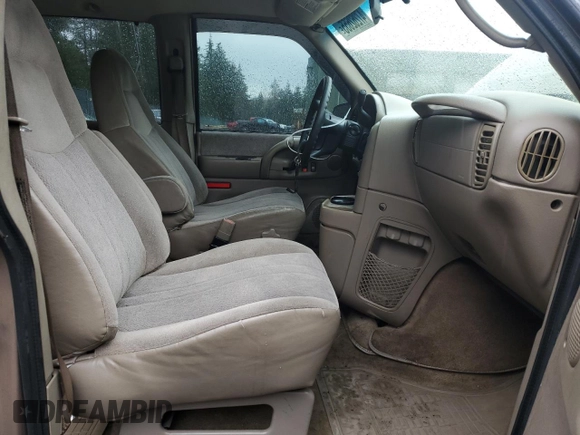 2003 GMC Safari z VIN 1GKEL19X43B503725, wystawiony jako Copart lot #47262655 z przebiegiem 208 200 mil mil oraz Szkody całkowita. Historia ofert i sprzedaży dostępna na DreamBid. Obrazek 7.