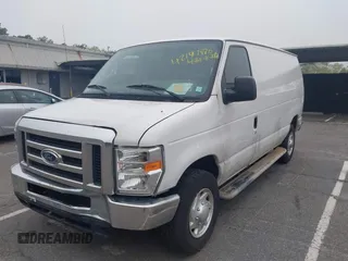 2012 Ford Econoline Cargo Recreational with VIN 1FTNE2EW8CDA64042, listed as a IAAI auction lot 42197470 with 130,647 mi miles. Bid and sale history available at carsss.com. Image 2.