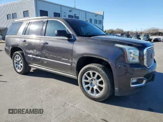 2015 GMC Yukon Denali with VIN 1GKS1CKJ7FR132677, listed as a Copart auction lot 47820925 with 144,821 mi miles and Salvage Title. Bid and sale history available at carsss.com. Image 4.