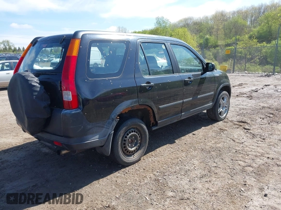 2002 Honda CR-V LX with VIN JHLRD68402C018458, listed as a IAAI auction lot 42206935 with 212,229 mi miles and . Bid and sale history available at carsss.com. Image 4.