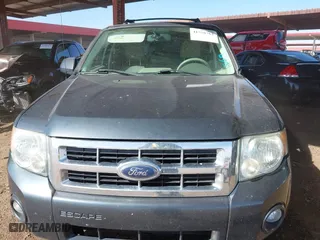 2008 Ford Escape Hybrid with VIN 1FMCU49HX8KB90001, listed as a IAAI auction lot 41558762 with 200,677 mi miles. Bid and sale history available at carsss.com. Image 12.