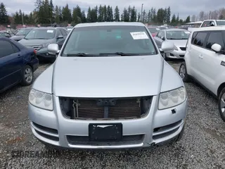 2006 Volkswagen Touareg 4.2L V8 z VIN WVGZM77L06D043948, wystawiony jako IAAI lot #41839431 z przebiegiem 207 496 mil mil oraz . Historia ofert i sprzedaży dostępna na DreamBid. Obrazek 12.