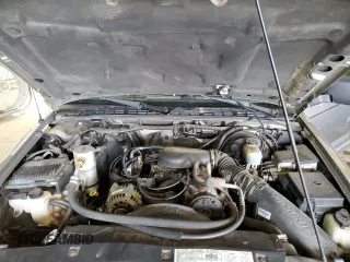 2000 Chevrolet Blazer LT z VIN 1GNDT13W1Y2282557, wystawiony jako Copart lot #55560775 z przebiegiem 219 795 mil mil oraz Szkoda całkowita • Salvage title. Historia ofert i sprzedaży dostępna na DreamBid. Obrazek 12.