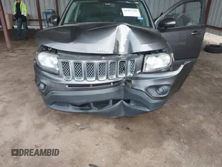 2016 Jeep Compass Latitude with VIN 1C4NJCEA2GD599833, listed as a IAAI auction lot 41507729 with 107,187 mi miles. Bid and sale history available at carsss.com. Image 6.