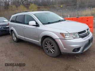 2013 Dodge Journey SXT with VIN 3C4PDCBG1DT647014, listed as a IAAI auction lot 42006636 with 192,911 mi miles. Bid and sale history available at carsss.com. Image 1.