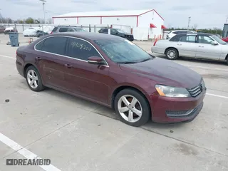 2012 Volkswagen Passat SE w/Sunroof with VIN 1VWBH7A31CC076037, listed as a IAAI auction lot 41905200 with 141,809 mi miles. Bid and sale history available at carsss.com. Image 1.