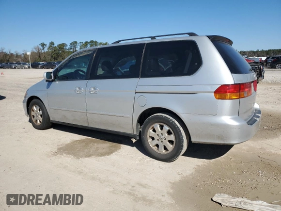 2003 Honda Odyssey EX-L with VIN 5FNRL18903B145567, listed as a Copart auction lot 47925695 with 294,627 mi miles and Salvage Title. Bid and sale history available at DreamBid. Image 2.
