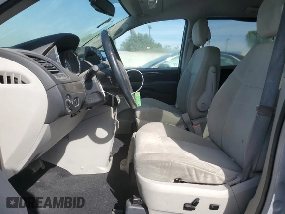 2014 Dodge Grand Caravan SE 30th Anniversary with VIN 2C4RDGBG5ER209391, listed as a Copart auction lot 76408524 with 136,403 mi miles and Clean Title. Bid and sale history available at DreamBid. Image 7.