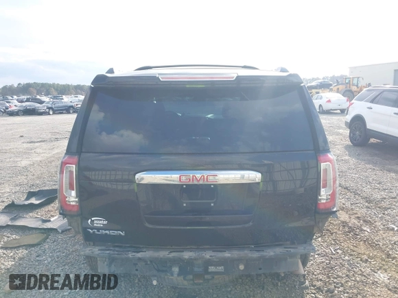 2015 GMC Yukon Denali with VIN 1GKS1CKJ8FR612971, listed as a IAAI auction lot 41519689 with 197,003 mi miles. Bid and sale history available at carsss.com. Image 16.