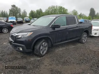2017 Honda Ridgeline RTL with VIN 5FPYK3F51HB012972, listed as a Copart auction lot 58789565 with 135,725 mi miles and Salvage title. Bid and sale history available at DreamBid. Image 1.