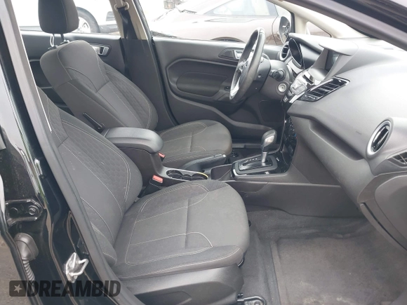 2016 Ford Fiesta SE z VIN 3FADP4BJ6GM107996, wystawiony jako IAAI lot #42433173 z przebiegiem 61 302 mil mil oraz . Historia ofert i sprzedaży dostępna na DreamBid. Obrazek 5.