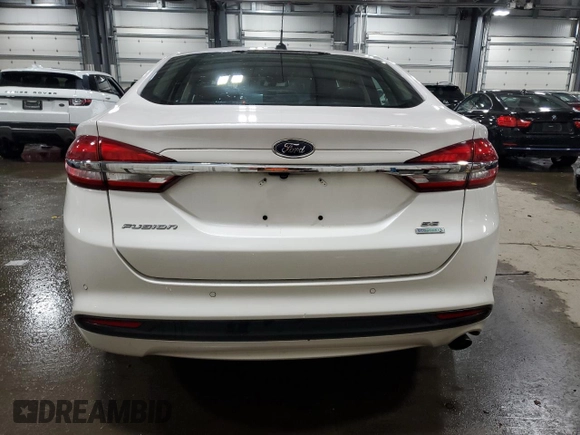 2018 Ford Fusion SE with VIN 3FA6P0HD9JR211234, listed as a Copart auction lot 84538984 with 101,157 mi miles and Salvage Title. Bid and sale history available at carsss.com. Image 6.