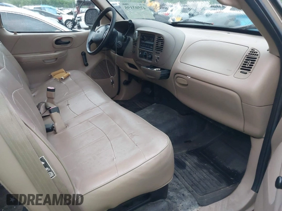 1999 Ford F-150 z VIN 1FTZX1727XNC32012, wystawiony jako IAAI lot #42503195 z przebiegiem 1 805 469 mil mil oraz . Historia ofert i sprzedaży dostępna na DreamBid. Obrazek 5.