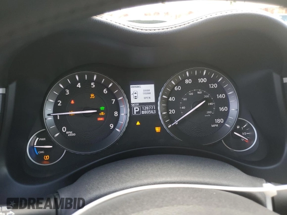 2012 Infiniti M Hybrid with VIN JN1EY1AP3CM910631, listed as a Copart auction lot 49162705 with 128,771 mi miles and Salvage title. Bid and sale history available at DreamBid. Image 9.