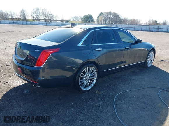 2016 Cadillac CT6 Premium Luxury AWD with VIN 1G6KF5RS6GU159166, listed as a IAAI auction lot 41764385 with 118,428 mi miles and . Bid and sale history available at DreamBid. Image 4.