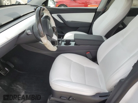 2020 Tesla Model Y Long Range with VIN 5YJYGDEF2LF006357, listed as a Copart auction lot 54888215 with 55,983 mi miles and Salvage Title. Bid and sale history available at DreamBid. Image 7.