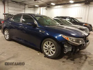 2016 Kia Optima LX with VIN 5XXGT4L34GG002569, listed as a IAAI auction lot 41732810 with 148,044 mi miles. Bid and sale history available at carsss.com. Image 1.