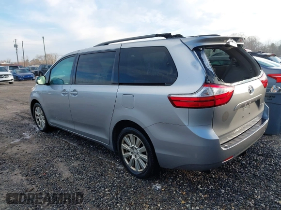 2017 Toyota Sienna LE with VIN 5TDJZ3DC6HS184126, listed as a IAAI auction lot 41166135 with 101,305 mi miles. Bid and sale history available at carsss.com. Image 3.