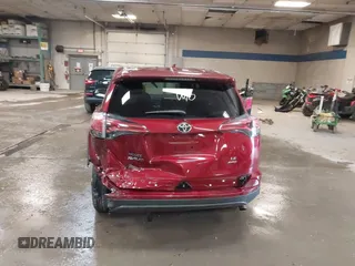 2018 Toyota RAV4 LE with VIN 2T3BFREV9JW825953, listed as a IAAI auction lot 42463780 with 74,128 mi miles and . Bid and sale history available at DreamBid. Image 16.
