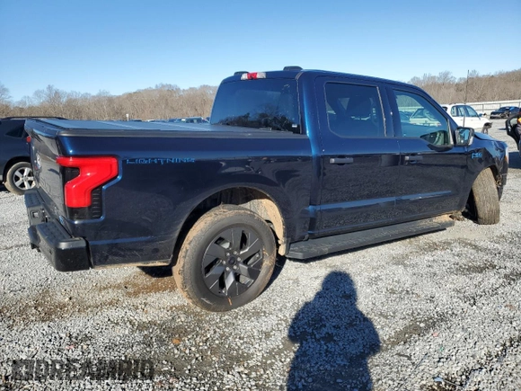 2024 Ford F-150 Lightning XLT with VIN 1FTVW3LK1RWG18473, listed as a Copart auction lot 86523084 with 6,824 mi miles and Salvage title. Bid and sale history available at DreamBid. Image 3.