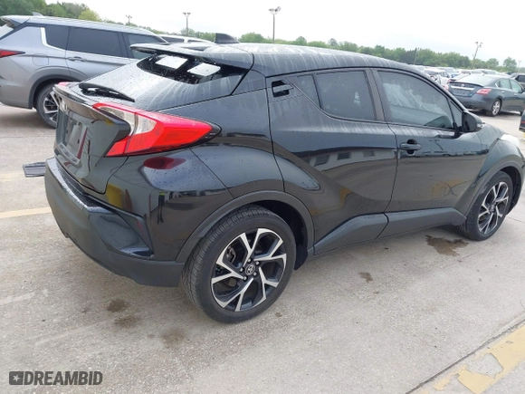 2019 Toyota C-HR XLE with VIN NMTKHMBX2KR094898, listed as a IAAI auction lot 41940883 with 94,351 mi miles. Bid and sale history available at carsss.com. Image 4.