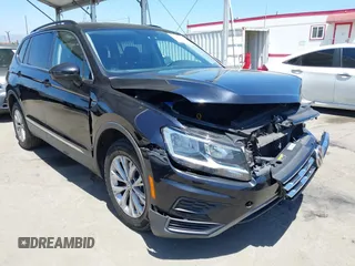 2018 Volkswagen Tiguan SEL z VIN 3VV3B7AX3JM210300, wystawiony jako IAAI lot #42189355 z przebiegiem 83 802 mil mil oraz . Historia ofert i sprzedaży dostępna na DreamBid. Obrazek 1.