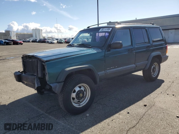 1997 Jeep Cherokee SE with VIN 1J4FJ28S0VL551442, listed as a Copart auction lot 49215195 with 164,356 mi miles and Salvage Title. Bid and sale history available at carsss.com. Image 1.