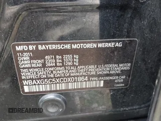 2012 BMW 5 Series 528i with VIN WBAXG5C5XCDX01864, listed as a IAAI auction lot 41910337 with 200,110 mi miles. Bid and sale history available at carsss.com. Image 9.